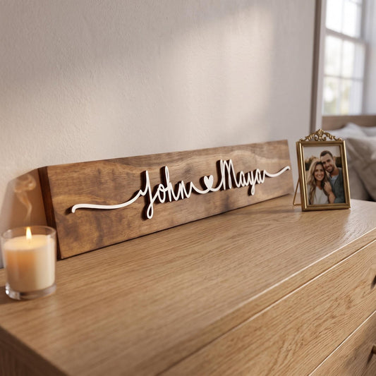 Slim personalized couple name wood sign with raised 3D names joined by a heart, Mocha stain, white lettering
