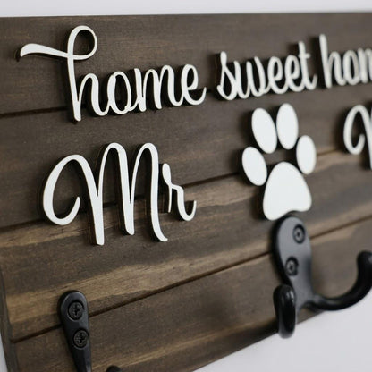 Home sweet home Mr and Mrs wood key and leash holder with white 3D lettering, paws over double hooks and black wall hooks