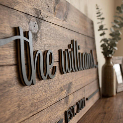Personalized family name wood sign with 3D script last name, established date and flourishes on shiplap pine